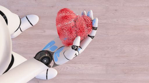 Ein Roboter hält ein Herz in seiner Hand.
