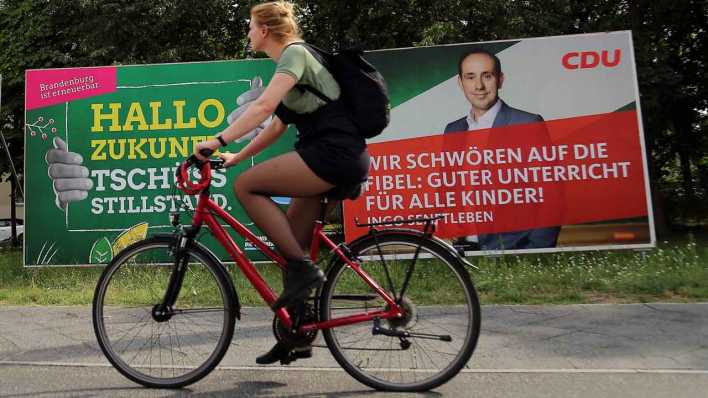 Wahlplakate Grüne und CDU (Bild: imago images)