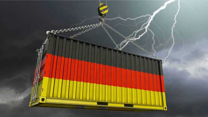 Symbolbild: Deutsche Exportwirtschaft - Container in Schwarz Rot Gold und Gewitter (Bild: imago images)