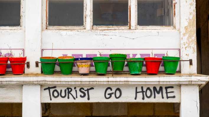 "Tourist go home" Graffiti in Spanien