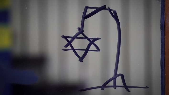 Eine antisemitische Schmiererei in Warschau zeigt einen Davidstern an einem Galgen.