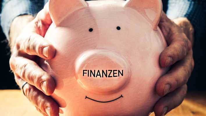 Symbolbild: Sparschwein und Finanzen