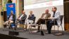 Die Diskussionsteilnehmenden auf dem Podium.