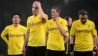 Deprimierte Dortmunder Spieler nach der Niederlage gegen Arsenal (Bild: dpa)