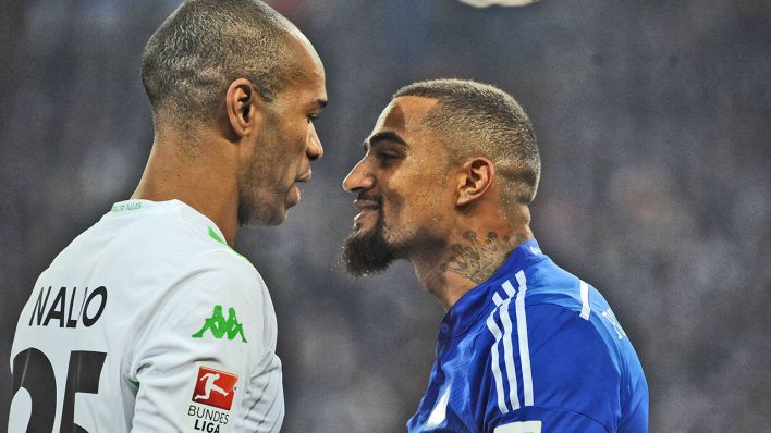 Kevin Prince Boateng (Schalke 04) bei einer Diskussion mit Naldo (Wolfsburg) (Bild: imago)